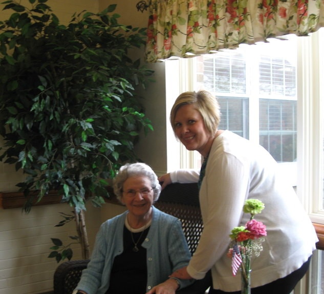en Murray, Director of Personal Care with Nancy Hutchison, enjoying the Florida Room