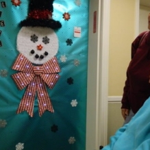 Holiday door decorating contest brings winter wonderland indoors
