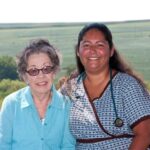 'Chrissy and Mary of Homeland smiling outside'
