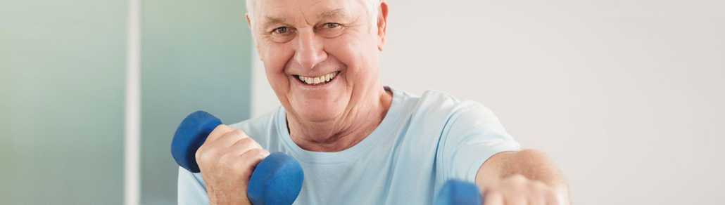 man enthusiastically lifting weights