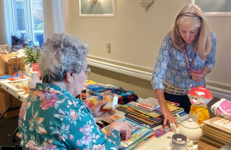 resident browsing items at the Homeland Holiday Bazaar