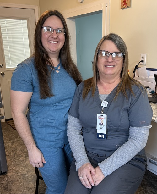 Mary Williard and Mandy Webster, mother and daughter smiling together