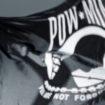 banner featuring a pow-mia flag