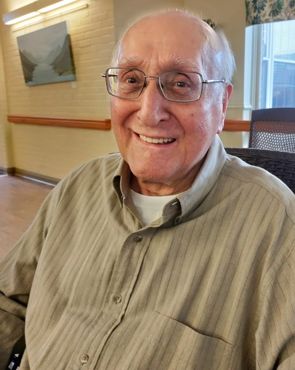 resident Mike Conte smiling in homeland center