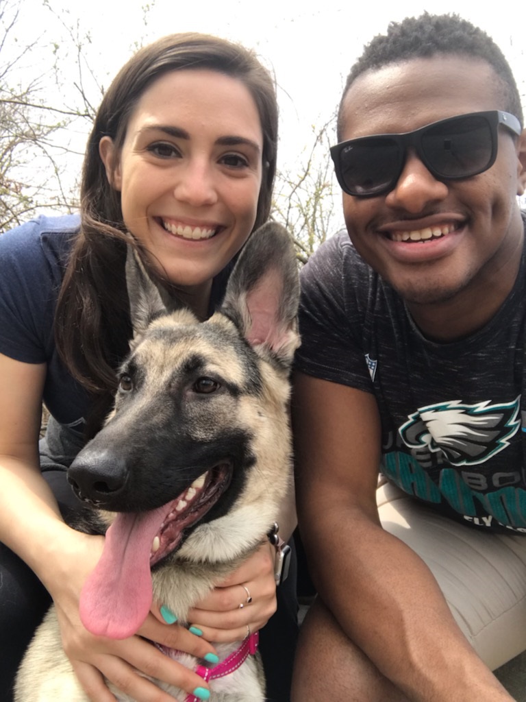 social worker Amanda Williams with her husband and their dog