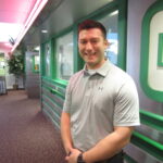 'quality assurance leader Jim Zorich standing in homeland center'