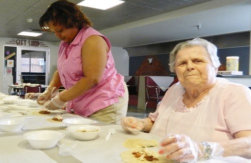 Activities coordinator Anita Payne and resident Naomi Packer