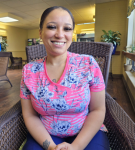 Homeland med tech Anna Leeland smiling in an armchair