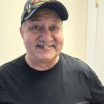 'resident Lionel Gonzalez looking happy'