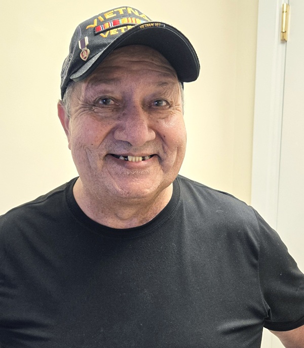 resident Lionel Gonzalez looking happy