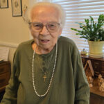 'Mary Deibler sitting in a Homeland Center suite'