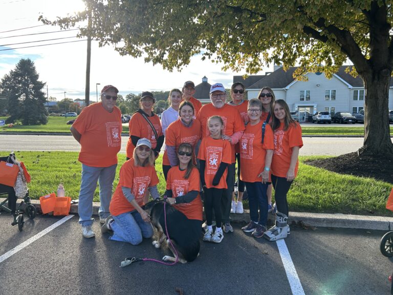group of participants posing together at the 5k and memorywalk